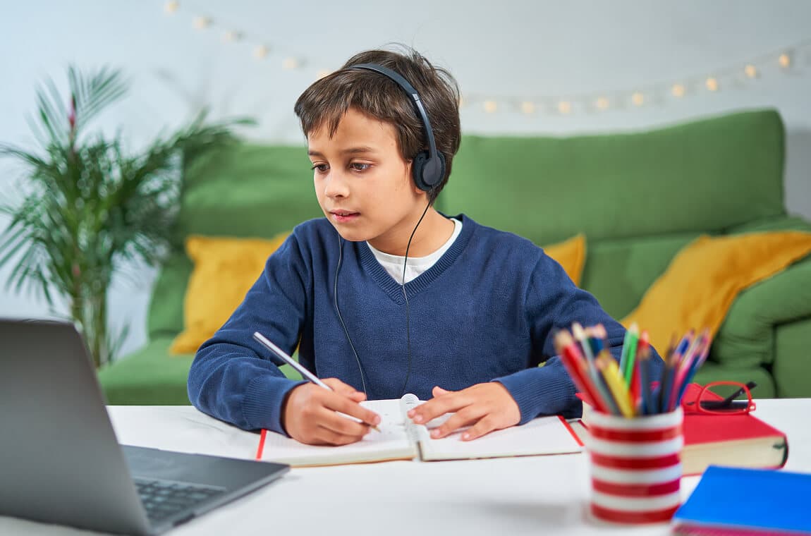 A student attending an online tutoring session with TutorShark