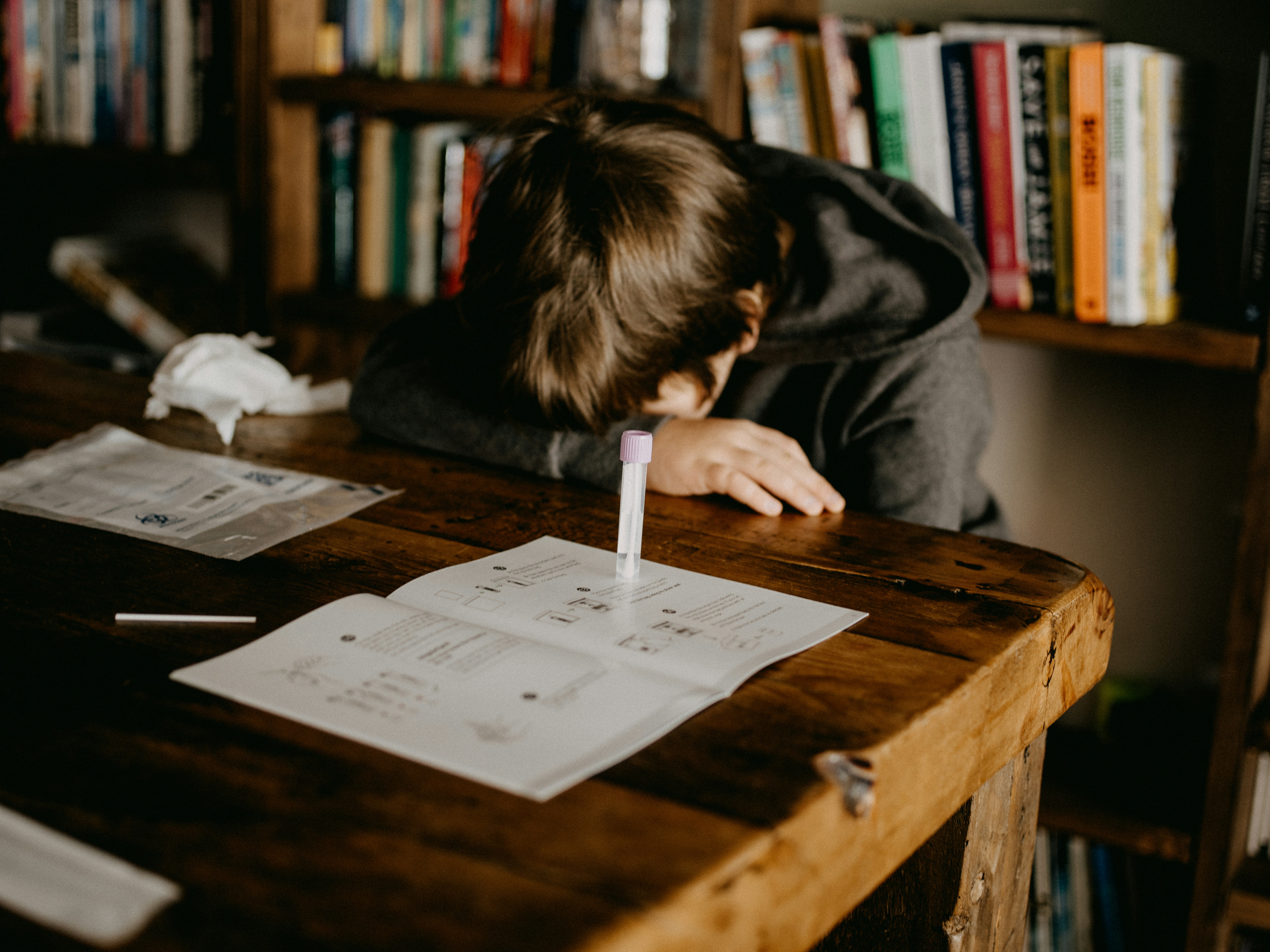 A child feeling overwhelmed by studying